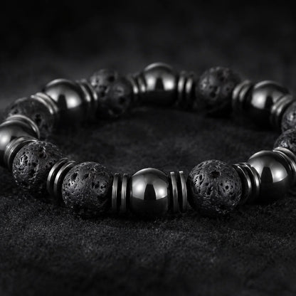 Perles d'hématite polie et de magnétite brute en alternance